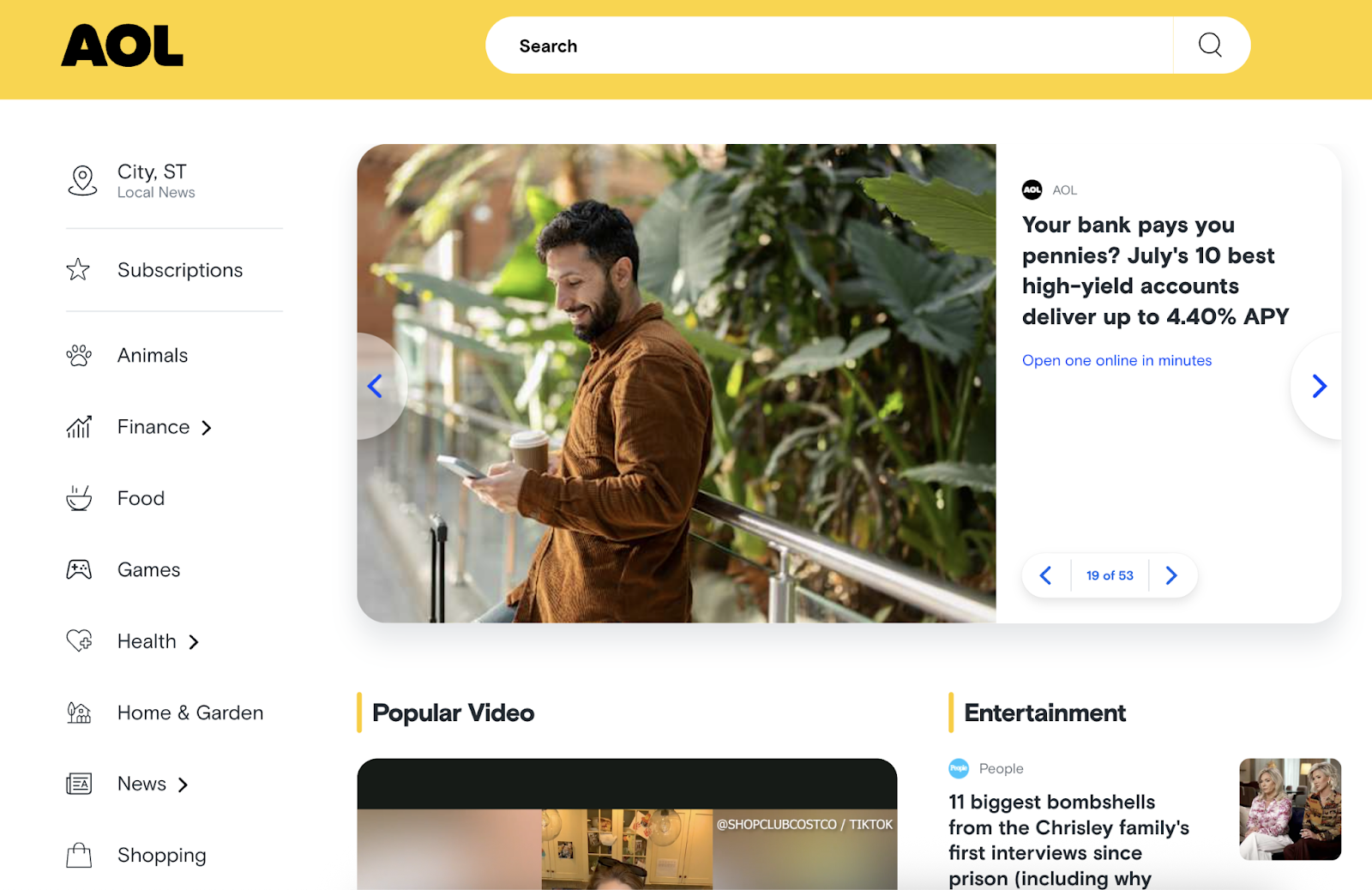 AOL homepage has categories, headline news, and search bar.